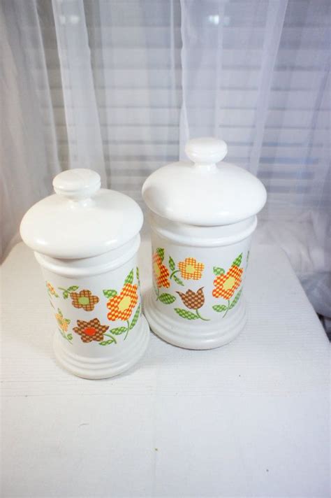 If your home is floral themed, minimalist, kitsch or bohemian, you can create a seamless style throughout your. McCoy Gingham Floral Canisters. Medium and Large Pair by ...