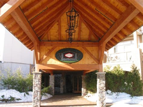 When you create a hip roof in a timber frame, there are different types of rafters used. Timber Frame Craftmanship | Timber Frame Roof Structures