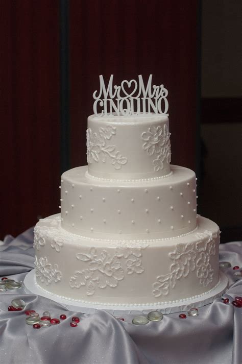 Three Tiered White Buttercream Wedding Cake