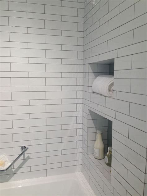 Herringbone inset subway tile bathroom. White subway tile w/ gray grout | Grey grout bathroom ...