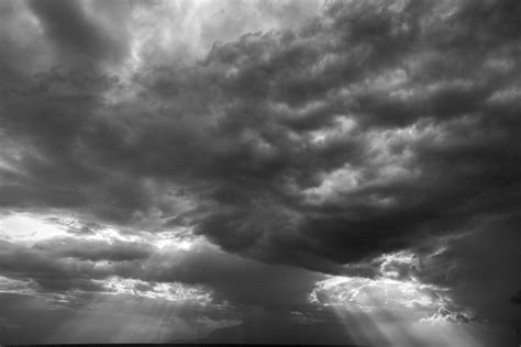 Grayscale Photo Of Dark Clouds In The Sky · Free Stock Photo