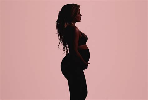 pregnant khloe kardashian poses for good mama maternity jeans