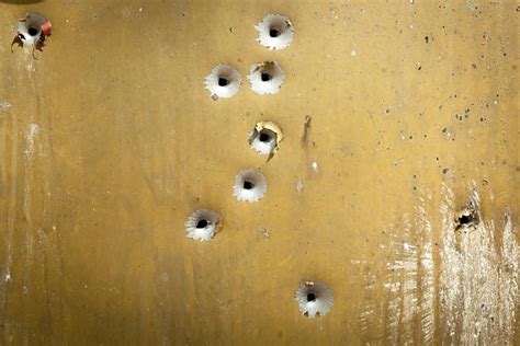 Bullet Hole Pictures Images And Stock Photos Istock