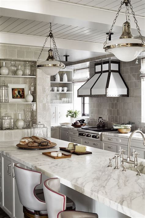 These white and gray marble tiles showcase an amazing chevron pattern proving that white and gray are definitely not boring! 40+ Awesome Kitchen Backsplash Ideas - For Creative Juice