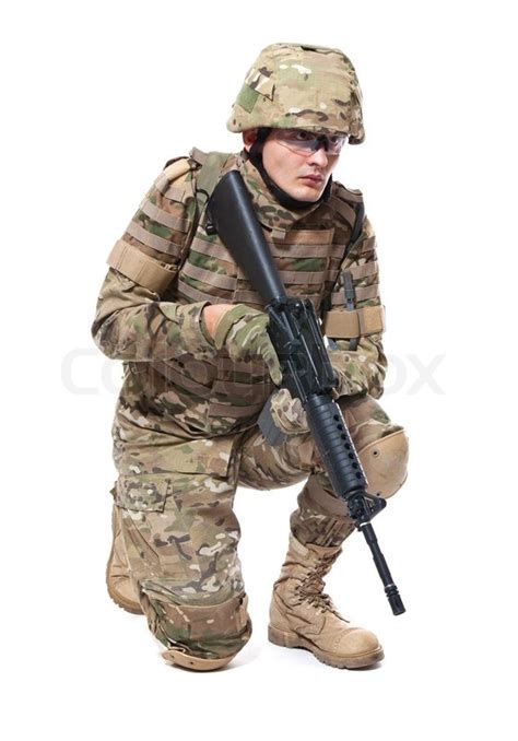 Modern Soldier With Rifle Isolated On A White Background Stock Photo