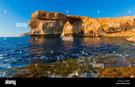 Azure Window Famous Stone Arch On Gozo Island With Reflection Malta