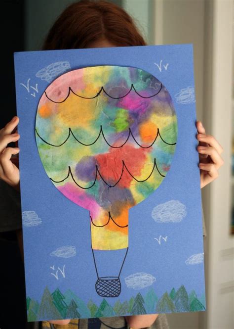 A fun transportation process art activity! Coffee Filter Hot Air Balloons | Make and Takes