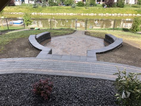 Rocky View Yards Landscaping Cobble Circle Pavers And Allan Block