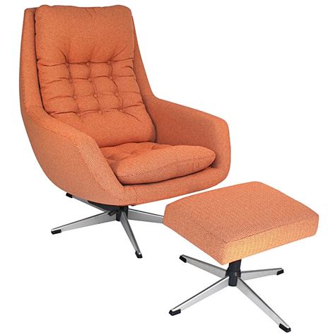 The ottoman is for you to relax your leg while reclining on this leisure chair. Swivel Lounge Chair and Ottoman by Selig at 1stdibs