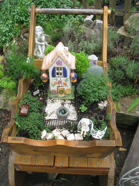 It is made on a wooden platform, covered with green spanish moss. Fairy Garden | Fairy garden, Outdoor decor, Decor