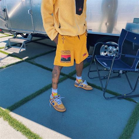 Spotted Travis Scott In Yellow Hues And Rare Nike Dunks Pause