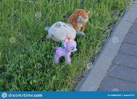 A Set Of Three Toys With A Purple Plastic Unicorn And Teddy Bears Stock Image Image Of Design