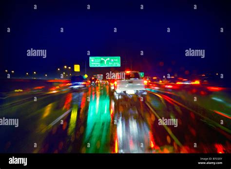 Cars On Highway At Night During Rain Storm Usa Stock Photo Alamy