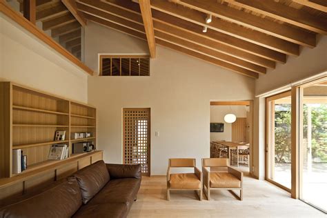 Timber Framed Japanese House Built Around Private Gardens