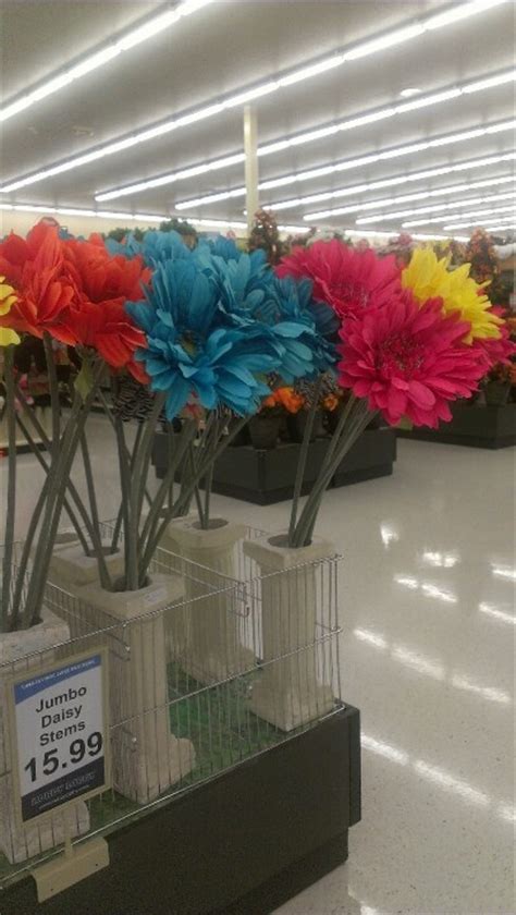 This realistic floral arrangement is wrapped in brown paper. Giant colorful flowers from Hobby Lobby. | Dream Home ...