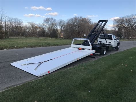 Flatbed Towing Truck For Efficient Vehicle Transportation