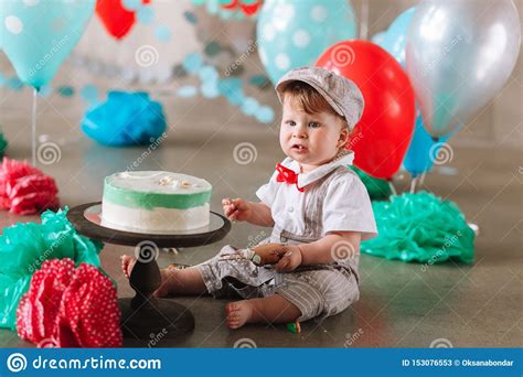 Maybe you would like to learn more about one of these? Little Baby Boy Eating Cake On His First Birthday ...
