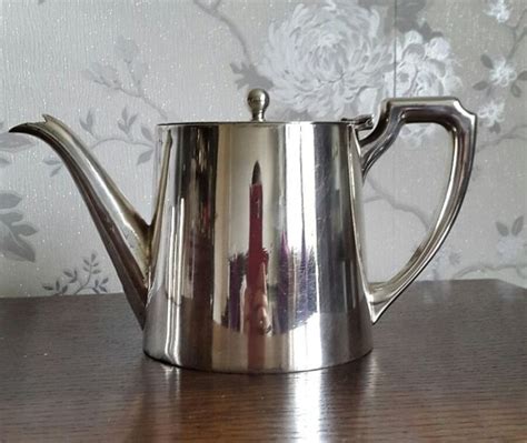 Four Piece Tea Set In English Sheffield Silver Plated Metal Marked As
