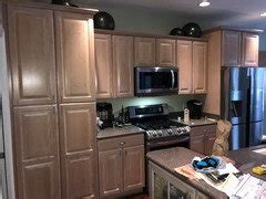 Affordable doorless kitchen cabinets ideas. Pickled oak cabinets has me in a pickle over wall color!