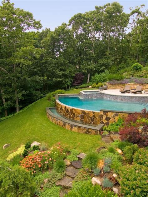 Stunning Infinity Pool An Arc Shaped Pool With A Spa Is Built Into The