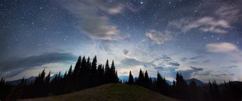 Beautiful Panoramic Snapshot Of A Starry Night In The Mountains Stock