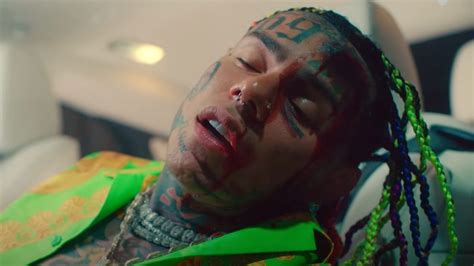 6ix9ine Sings Himself Back To Health After Car Crash In New Video