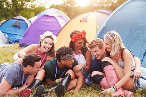 Friends Having Fun On The Campsite At A Music Festival Stock Image