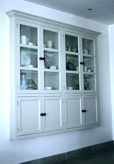 Set the upper cabinet on the wall so the bottom edge is resting on the support lumber. between the studs cabinet recessed cabinet drywall studs ...