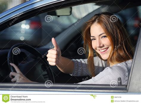Throw back odd pill find euphoria i once knew am i so dulled down? Happy Woman Inside A Car Gesturing Thumb Up Stock Image ...
