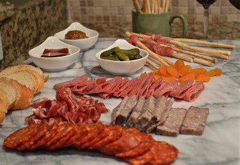Photo by chelsea kyle, prop styling by alex brannian how much meat? Cook's Guide To Making the Perfect Charcuterie Plate