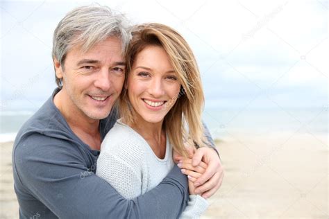 Mature Couple Embracing Stock Photo By Goodluz