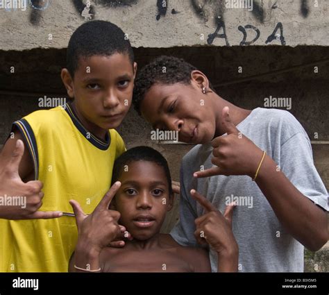 Three Young Boys From The Rocinha Favela In Rio De Janeiro Stock Photo