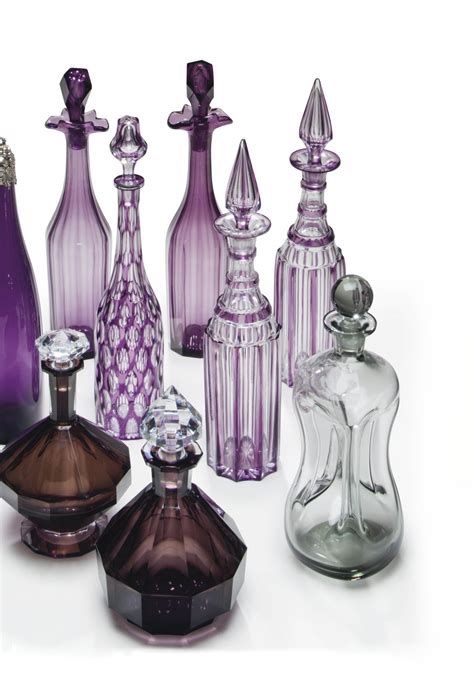 A Collection Of Nine Amethyst Glass Decanters And Stoppers 19th 20th Century Christie S