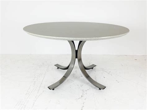 Four Legged Chrome Base Round Dining Table With White Quartz Top By