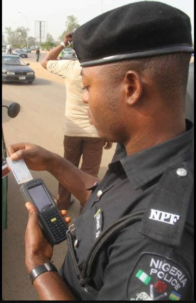 Nigerian Policeman Caught On Camera Using Pos Machine To Collect Bribe Photos Naijafm