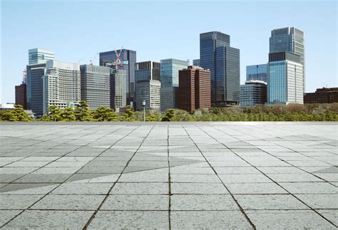 Empty Marble Floor With Cityscape And Skyline In Clear Blue Sky Royalty
