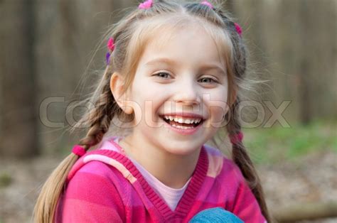 Little Girl Smiling Stock Photo Colourbox