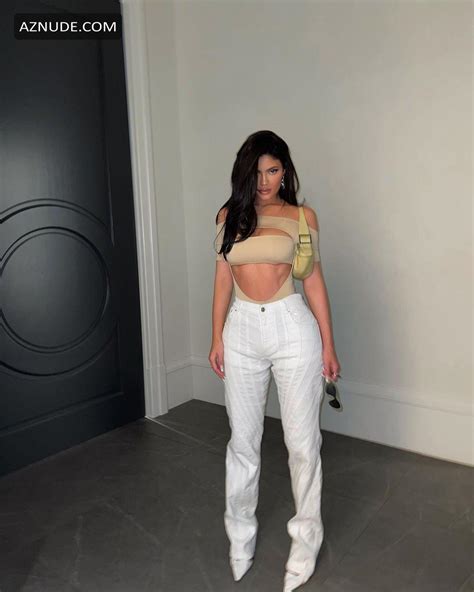 Kylie Jenner Sexy Shows Off Curves In A Strappy Nude Cutout Bodysuit
