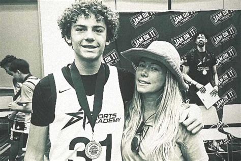 kendra wilkinson shares rare photo with son hank jr on his 14th birthday i m so proud of you