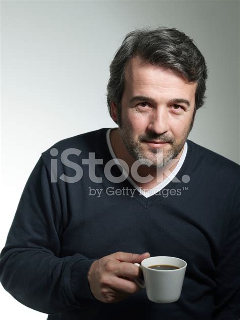 Happy Mature Man Drinking Coffee Stock Photo Royalty Free Freeimages