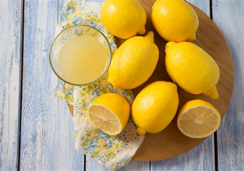 Squeezing Lemon Stock Photos Pictures And Royalty Free Images Istock