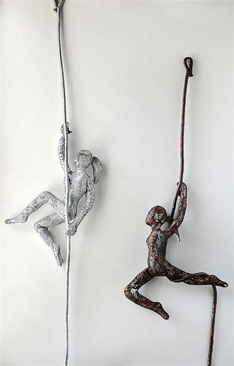 Metal Sculpture Climbing Woman With A Rope Rock Climber