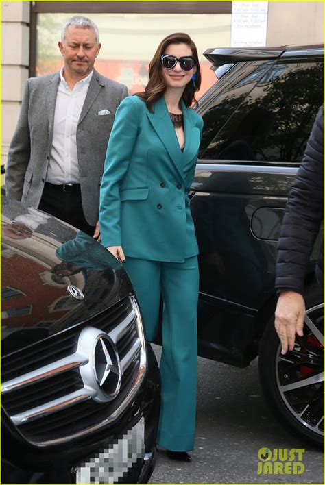 Photo Anne Hathaway Puts Fun Spin On Traditional Suit Look 02 Photo