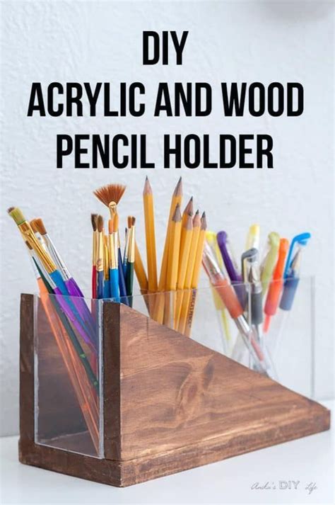 A Wooden Pencil Holder With Pens And Pencils In It That Says Diy