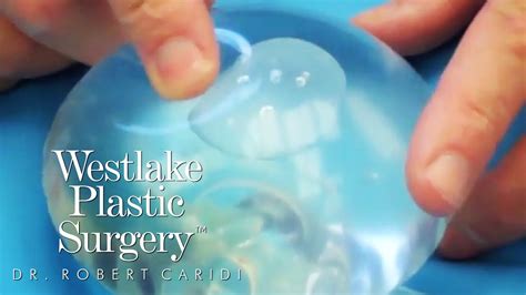 why do saline breast implants ripple what causes rippling of breast implants youtube