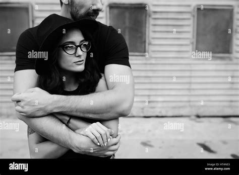 Guy Hugging Girlfriend From Behind Black And White Stock Photos