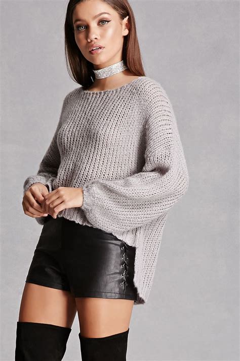 A Lightweight Brushed Open Knit Sweater Featuring Dropped Shoulders