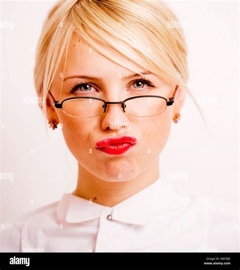 Very Emotional Businesswoman In Glasses Blond Hair On White Background Teacher Hands Up Posing