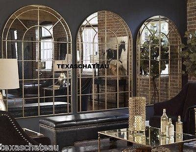 This oversized arch features a forged iron frame in a hand applied warm bronze finish with burnished distressing encasing an antique style mirror. Viewing Photos of Large Arched Window Mirrors (Showing 6 ...