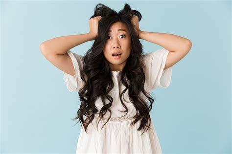 Premium Photo Shocked Scared Young Asian Beautiful Woman Posing
